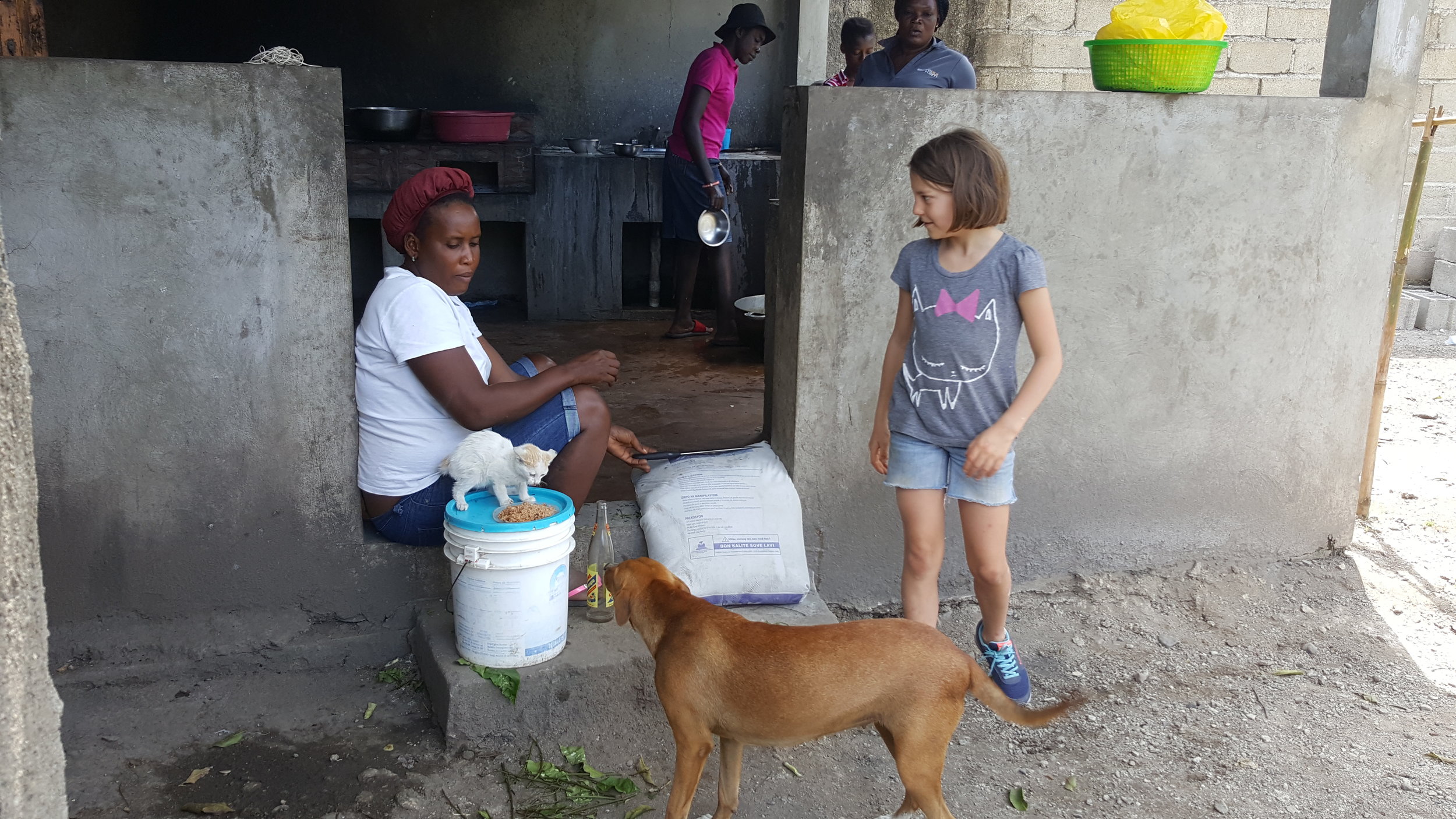  Gia spending time with GiGi near the kitchen, and her two buddies - Pistache the kitty and Mamba the dog. 