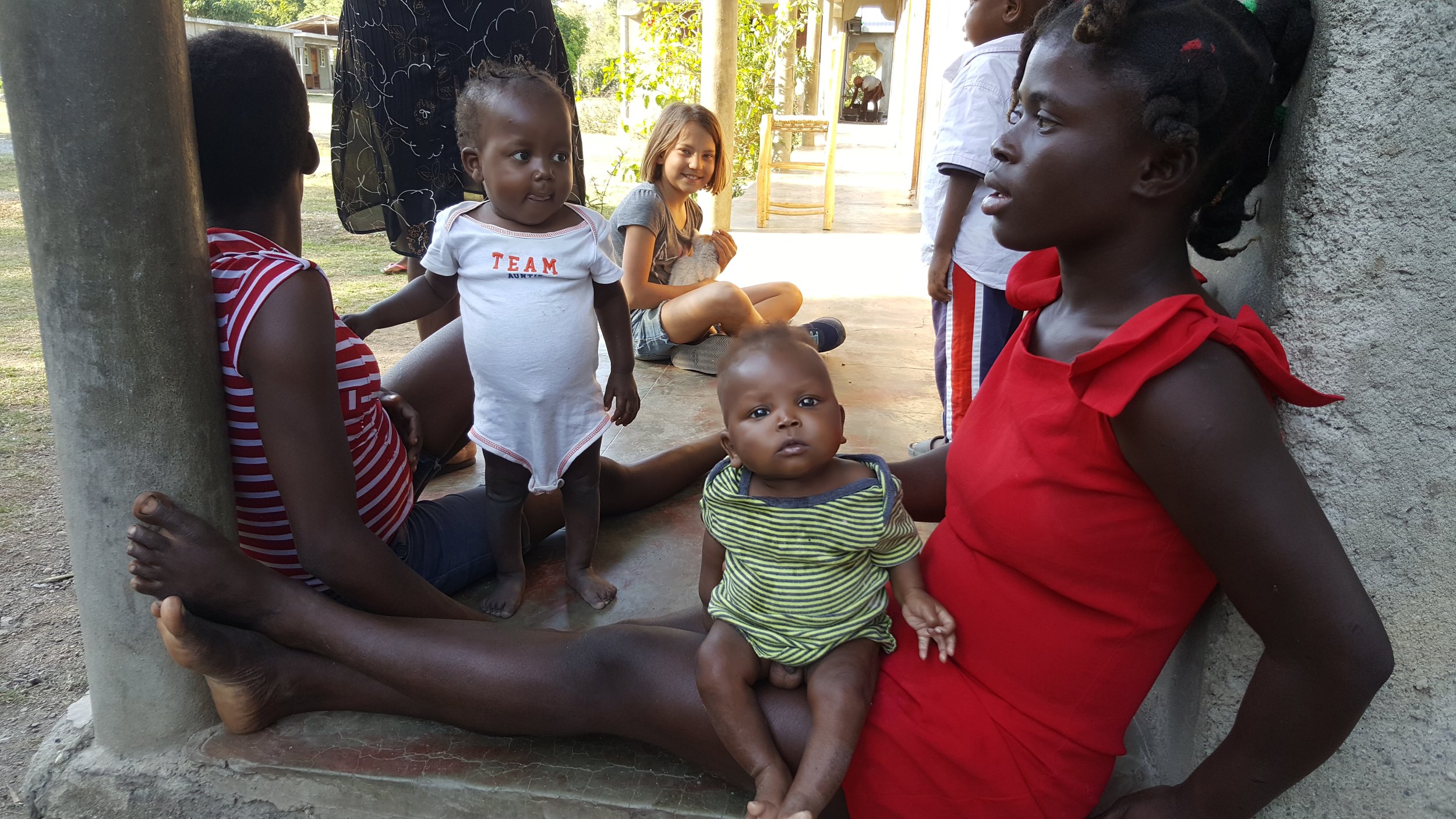 Spending some time with these young moms and their little ones.