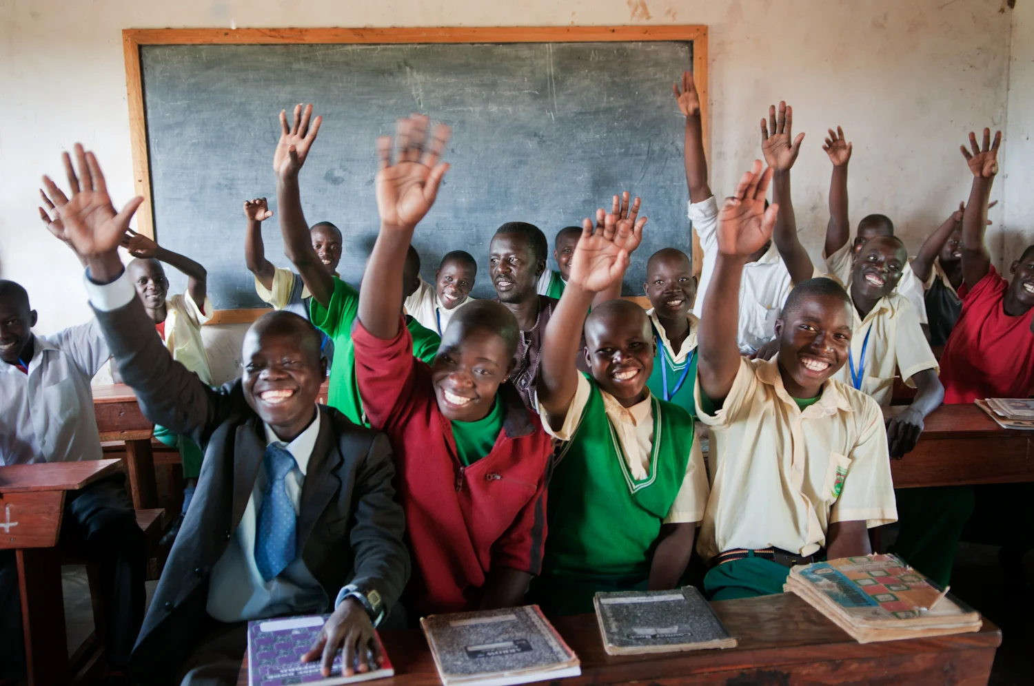 Sam Okello and students in the classroom at Hope North School and Vocational Centre, Kiryandongo District, Uganda (for Conde Nast Traveler). 