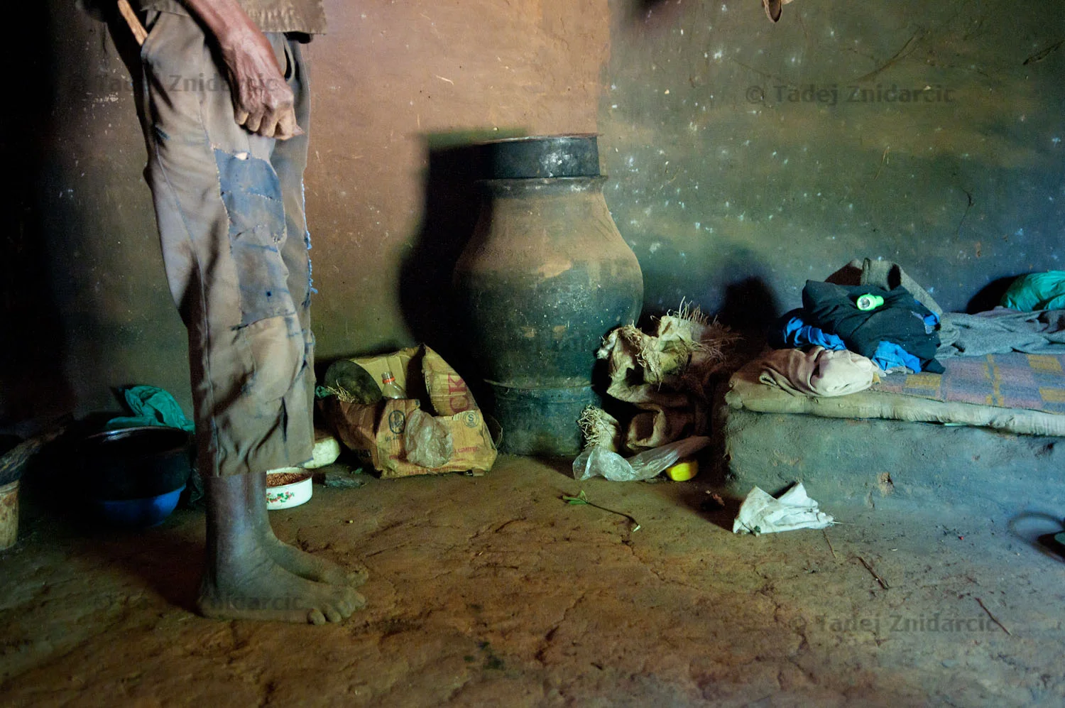 Odora Nakumiya stands in his hut in Panyum Obanlwane Village, Kitgum District. Nakumiya's 16-year old son Charles was abducted by the LRA in 1990s and has never returned. After the abduction, Nakumiya lost also his daughter and wife and now lives alone.