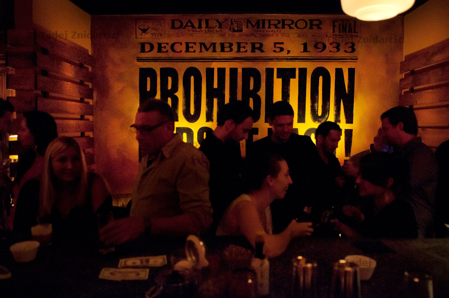 Enlarged front page of Daily Mirror from December 5, 1933 announcing the end of prohibition decorates the wall at P's & Q's Auto Body.