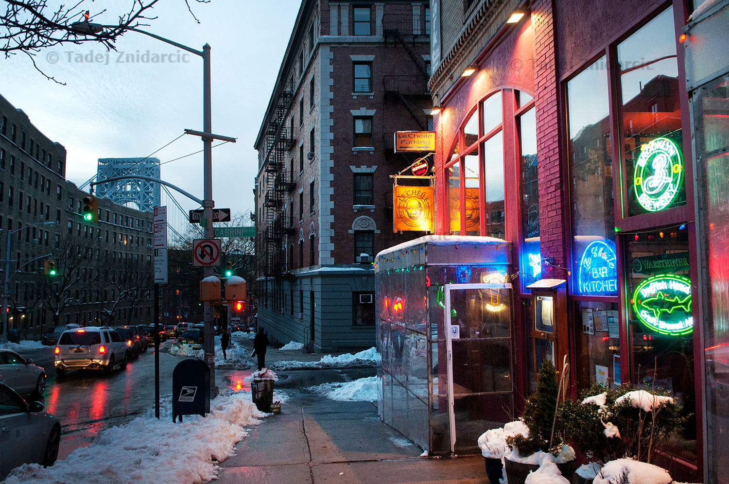 View of Le Cheile restaurant on 181st street with George Washington bridge in the background.