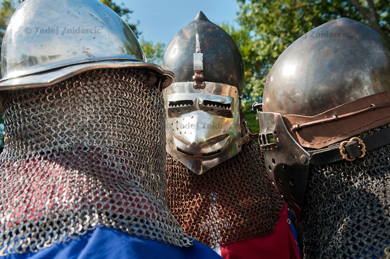 Knights discuss tactics before a 3 on 3 fight during the Medieval Festival at Fort Tryon park in New York City.