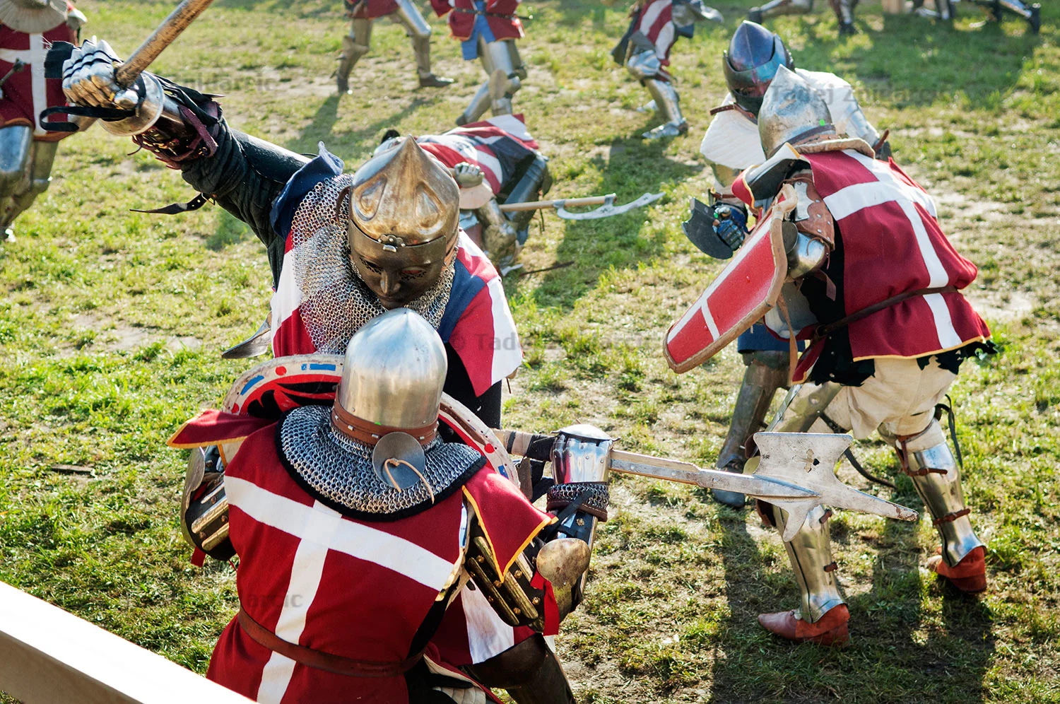 USA Knight Paul Friedel attacks Danish opponent during a 16 vs 16 match at the 2015 IMCF Medieval Combat World Championship at Malbork Castle, Poland.