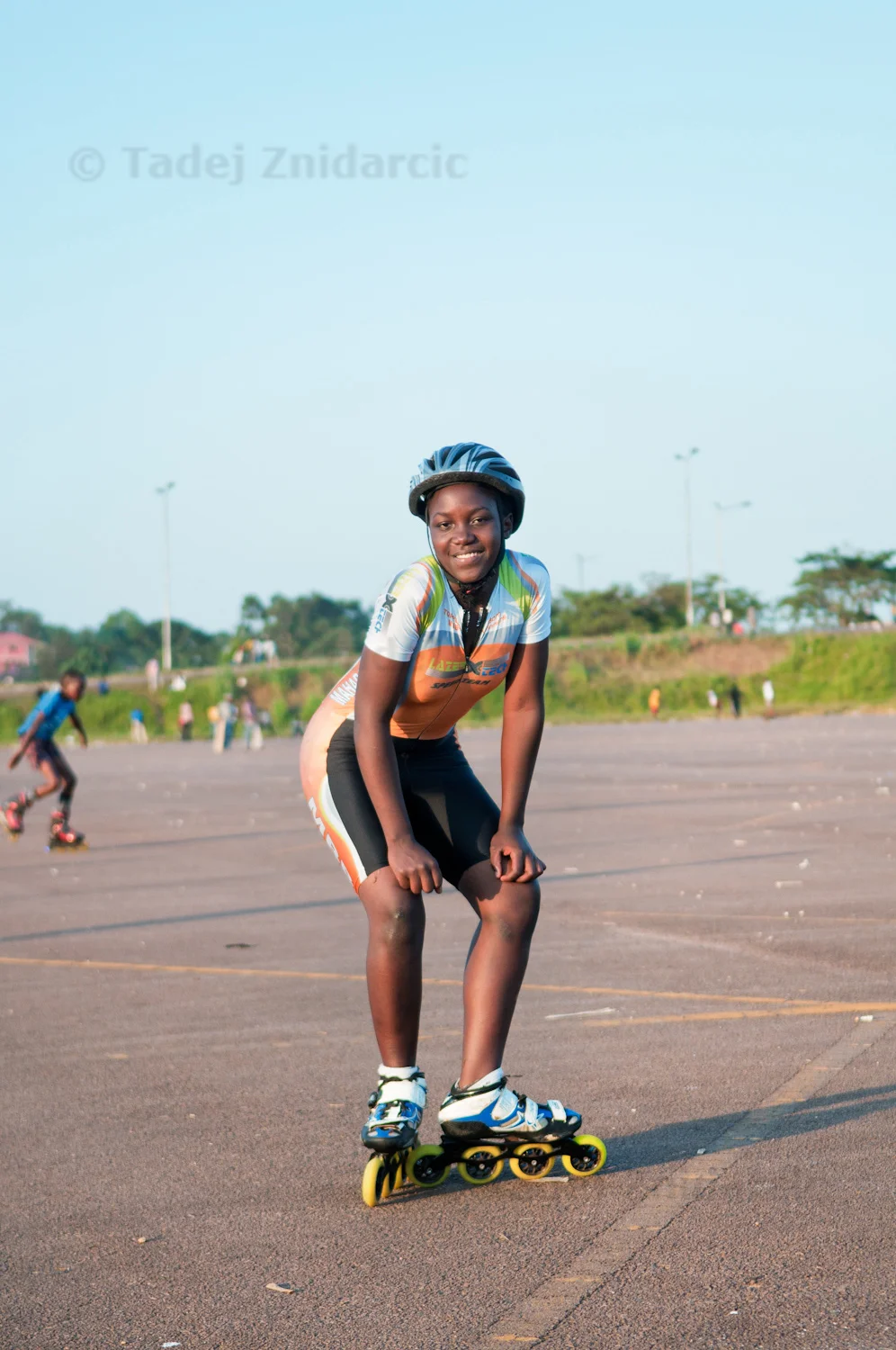 Namuwaya Patricia poses in skating gear at Mandela National Stadium's parking lot in Kampala, Uganda. Patricia is the best female skater in Uganda and has participated in several competitions in Uganda, Kenya and South Korea.