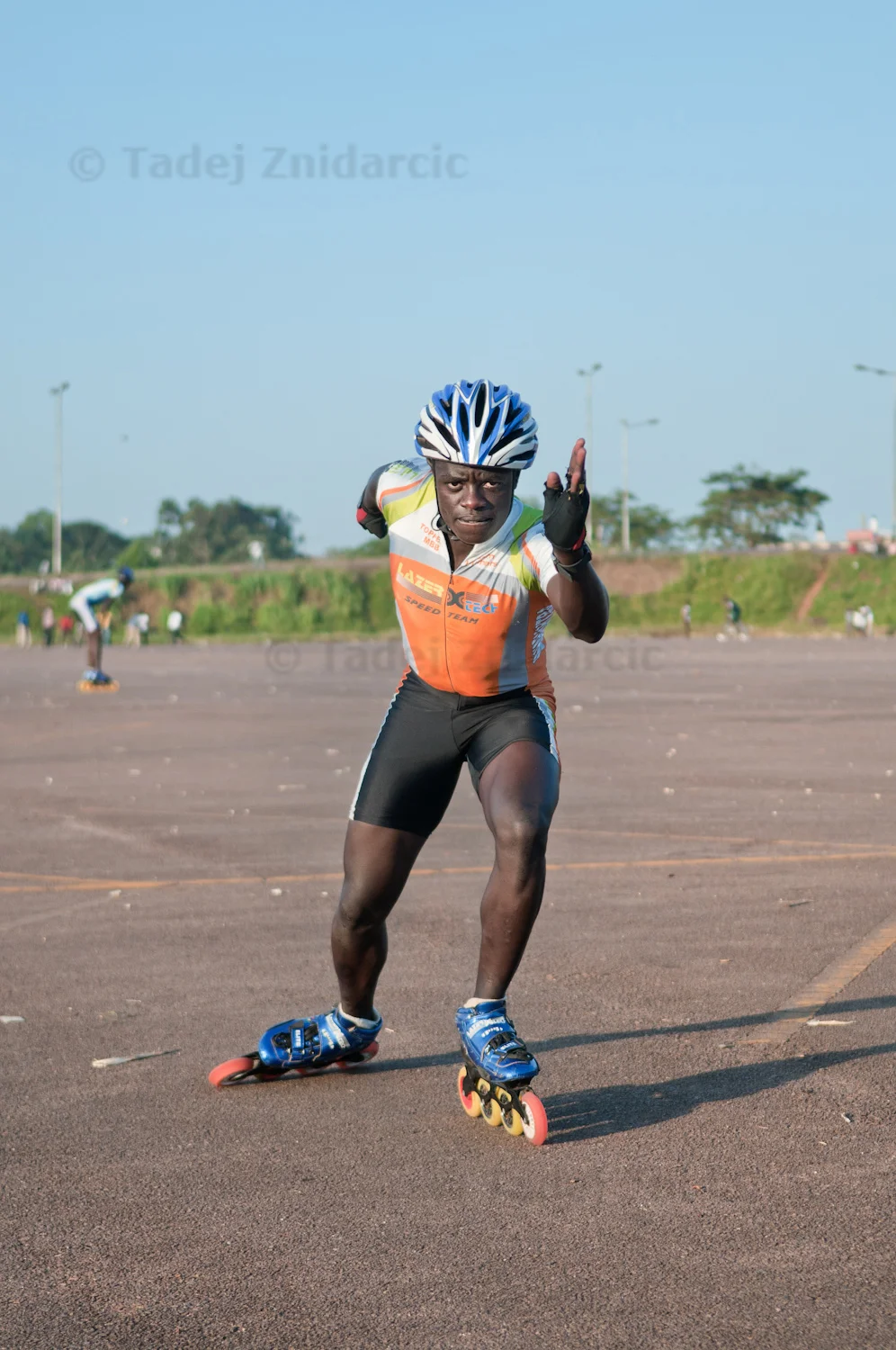 Serugo Geofrey (aka Kitintale) poses in skating gear at Mandela National Stadium's parking lot in Kampala, Uganda. Kitintale is Uganda's best long distance skater. 