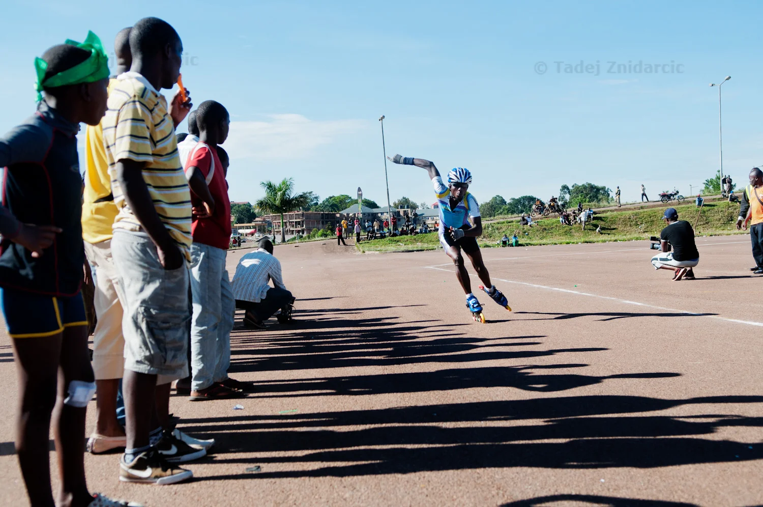 Kisitu Joseph speeds past spectators during the 1st East African inline skating competition at Mandela National Stadium's parking lot in Kampala, Uganda. The competition was first international competition in Uganda. Teams from Kenya and Rwanda also participated.