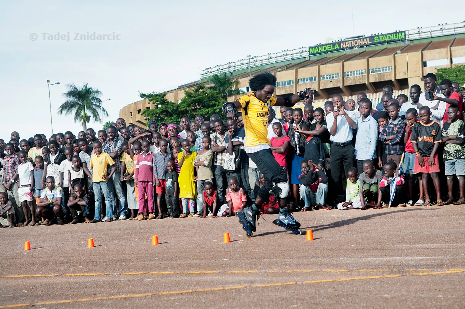 Ugandan street skater Levy shows his skating skills after the 2nd East African inline speed skating competition at Mandela National Stadium's parking lot in Kampala, Uganda. Though inline speed skating is not a mainstream sport in Uganda, competitions draw a lot of people.