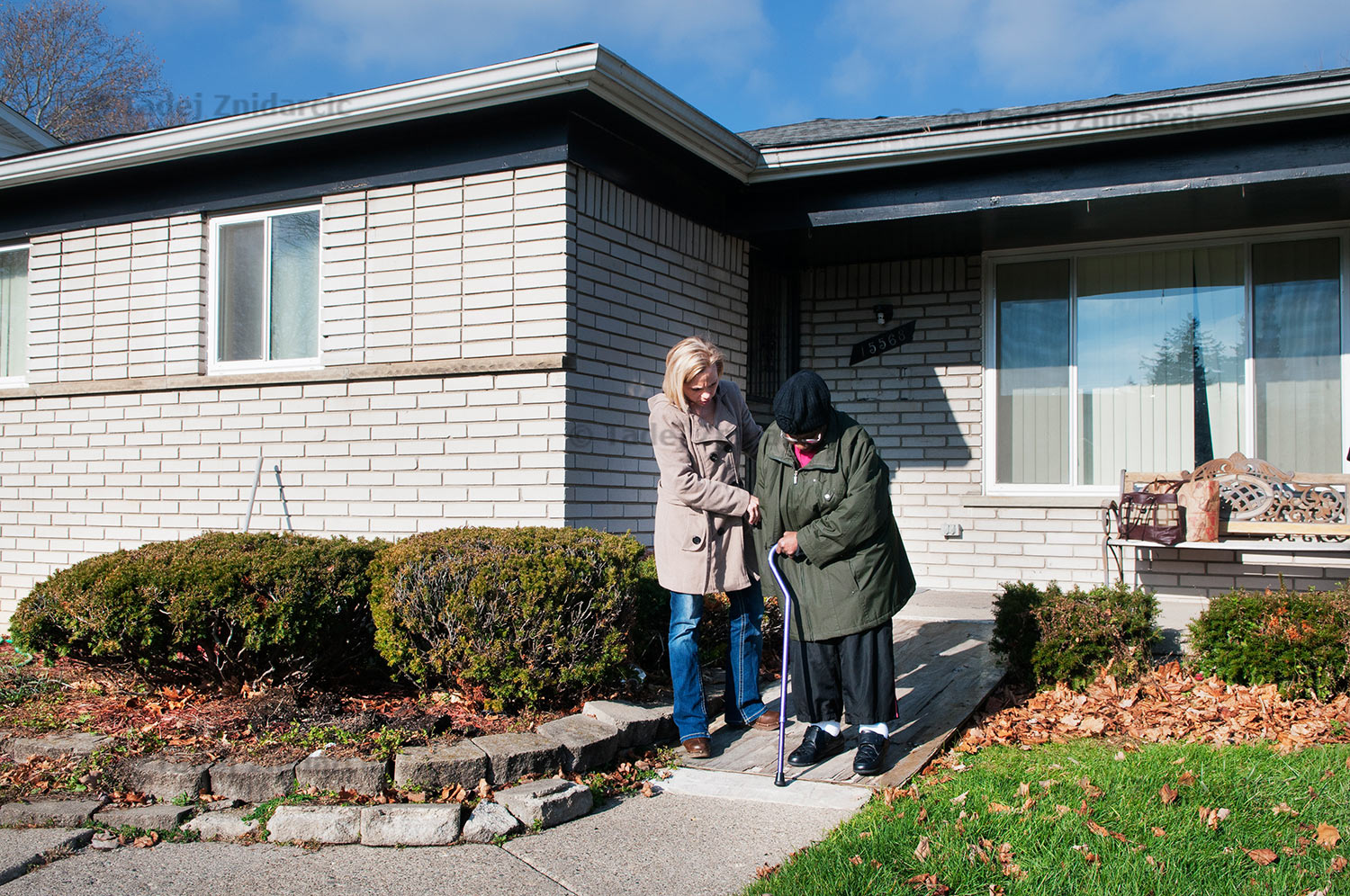 Katy lives at home but since she has trouble walking she doesn't go out much. During one of the visits occupational therapist Stacy helped Katy go down a ramp outside her home. 