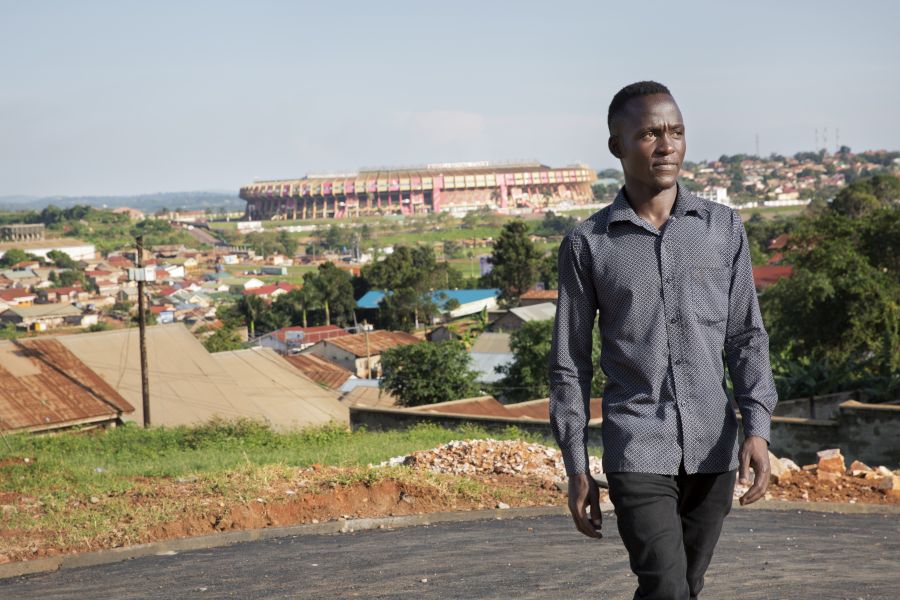 Peter walks in his neighbourhood that overlooks the stadium.