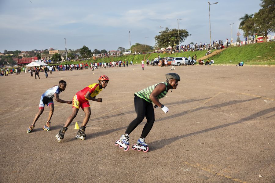 Peter and teammates practice at Mandela National Stadium.