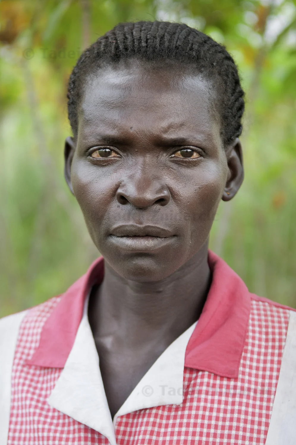 Akot Esther. Her daughter Akello Santina was abducted by the LRA at age 9 in 2000.