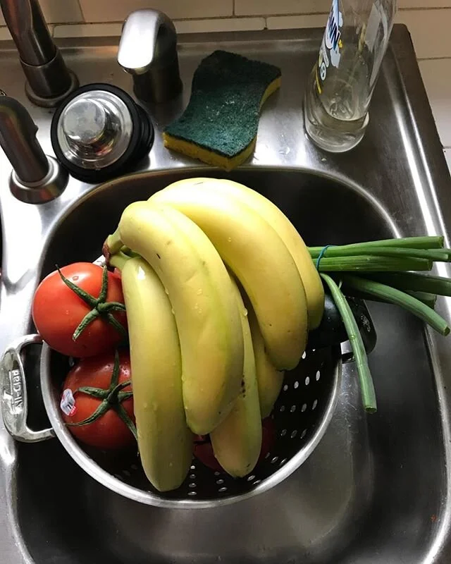 A sign of the times: washing bananas.