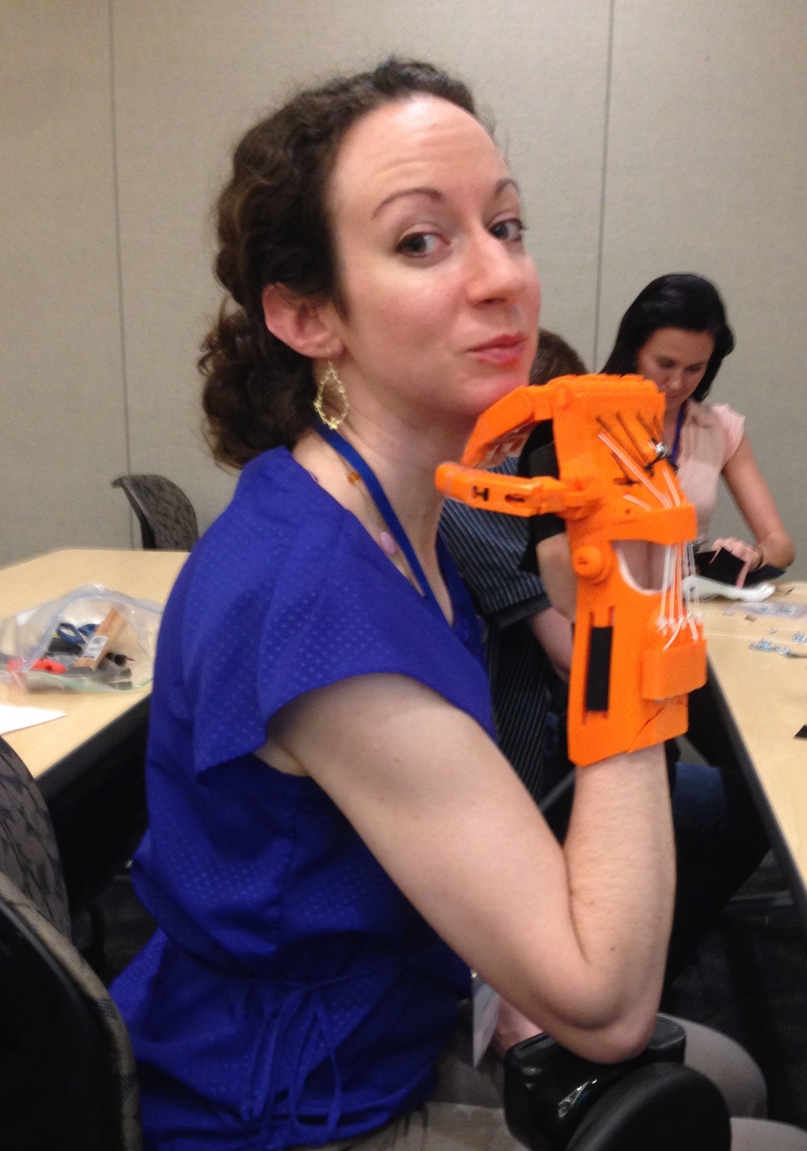 Angie Swindell, our Clinical Director models a device.