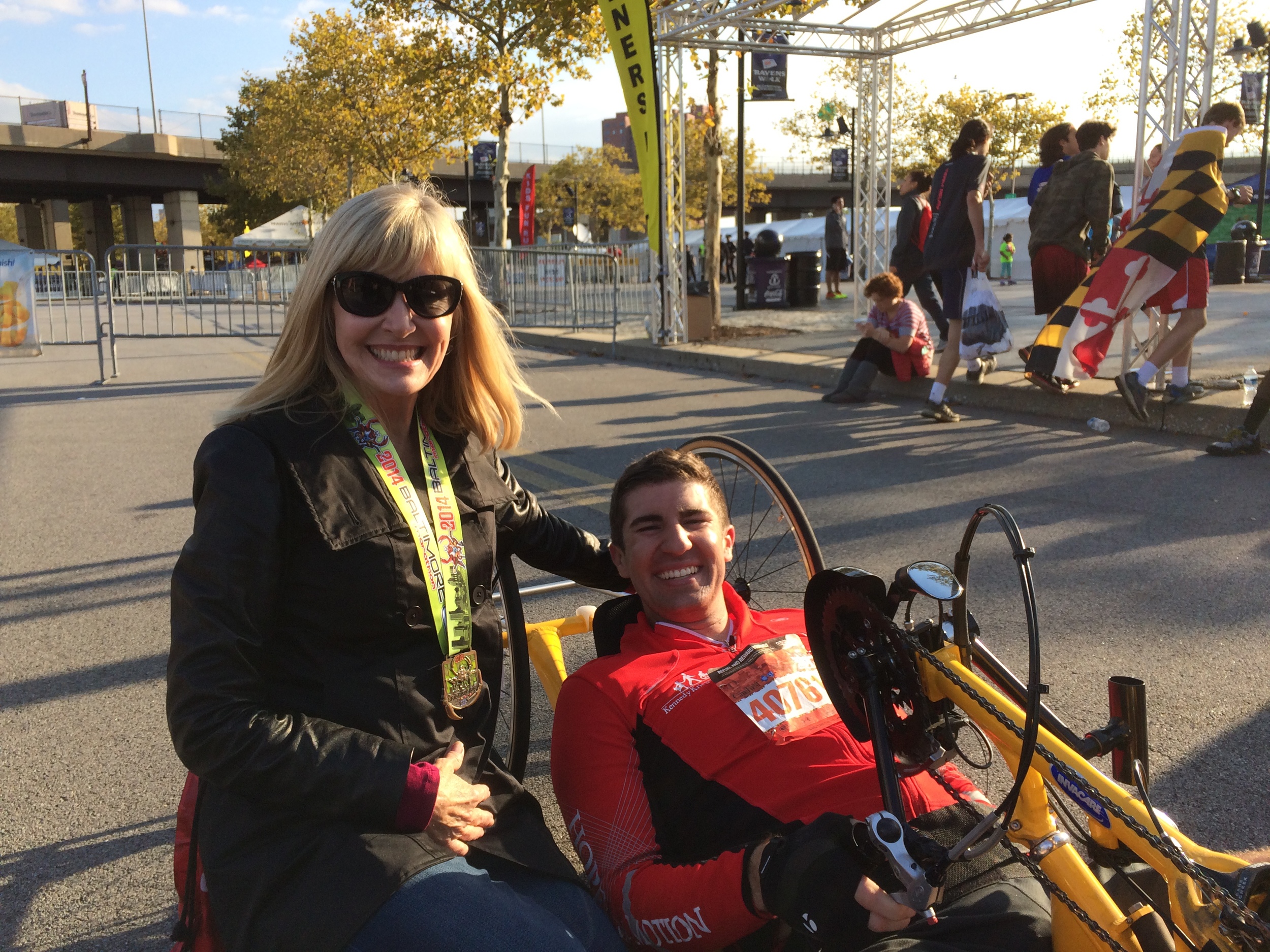 Mike and his mom at the Baltimore Running Festival, October 18, 2014, where he won 3rd place in the Handcycle division.