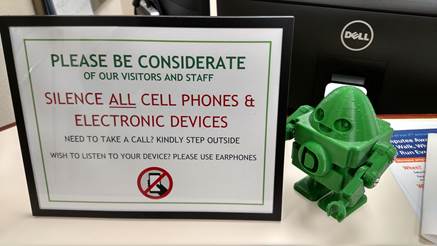 NER Cell phone sign.jpg