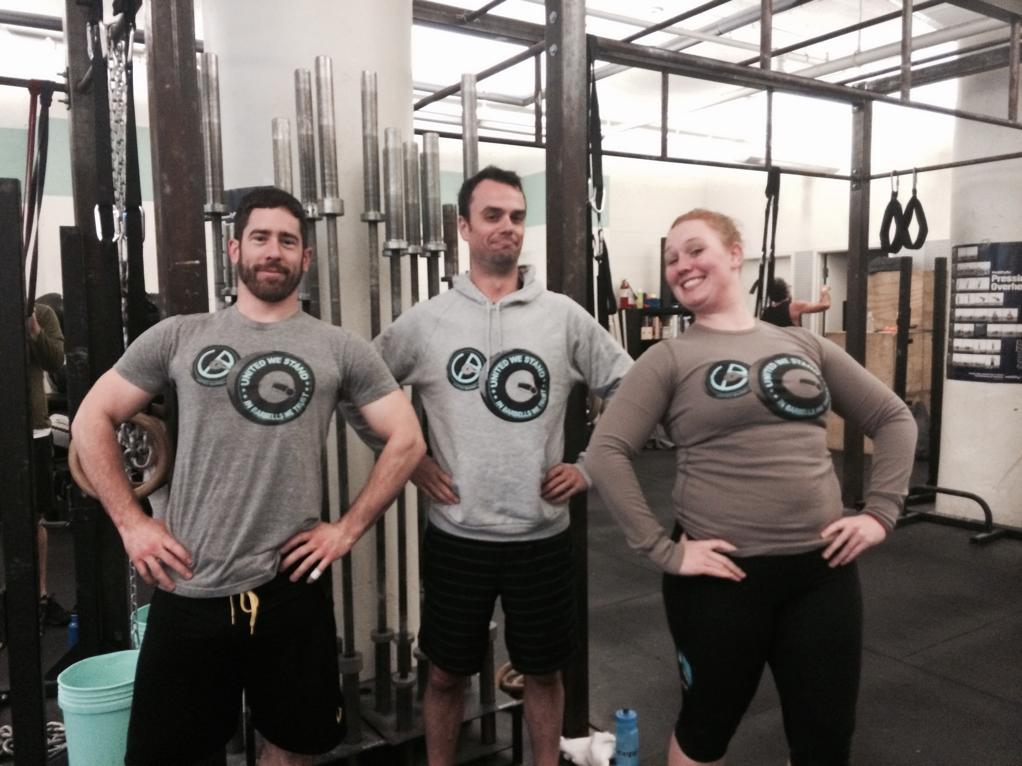 Andrew, Tristan, and Megan showing off their ub tees