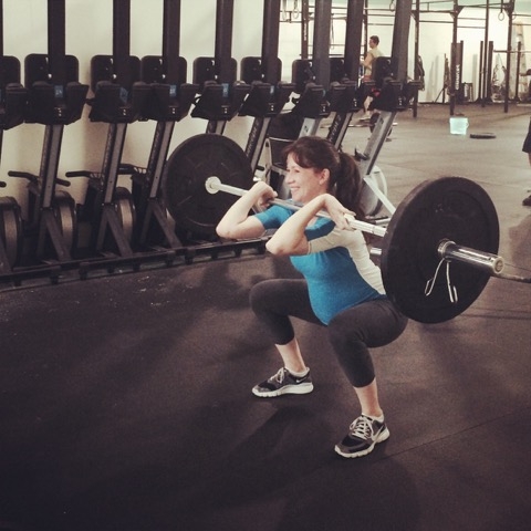 Squatting with weights while pregnant? Yes you can!