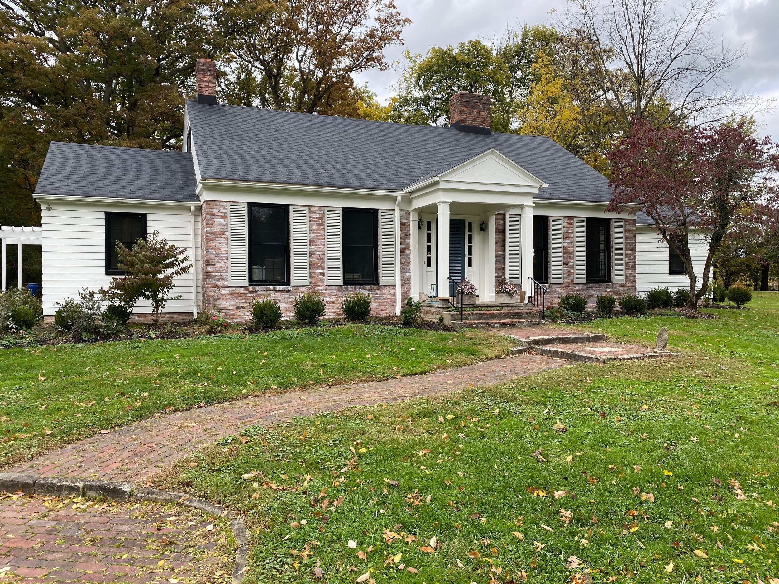 Exterior painting with brick faux finishing. Perrysburg, OH