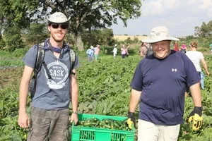 Pictured above, PotashCorp volunteers help with a harvest.
