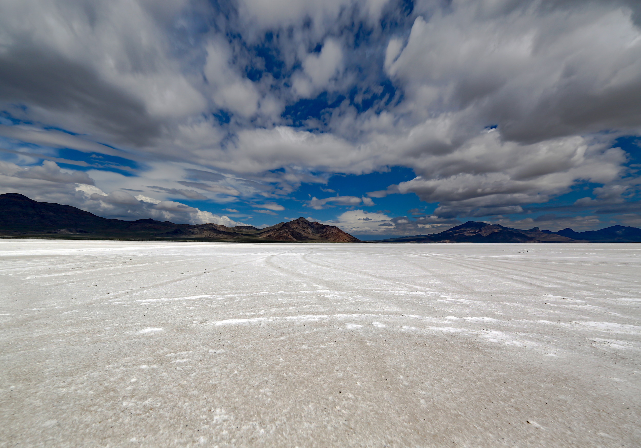 The salt flats are surrounded by unpopulated mountains rife with caverns and canyons for the adventurous traveler. It is not good to hike here by yourself or at night as this remote outpost is surrounded by rough terrain.