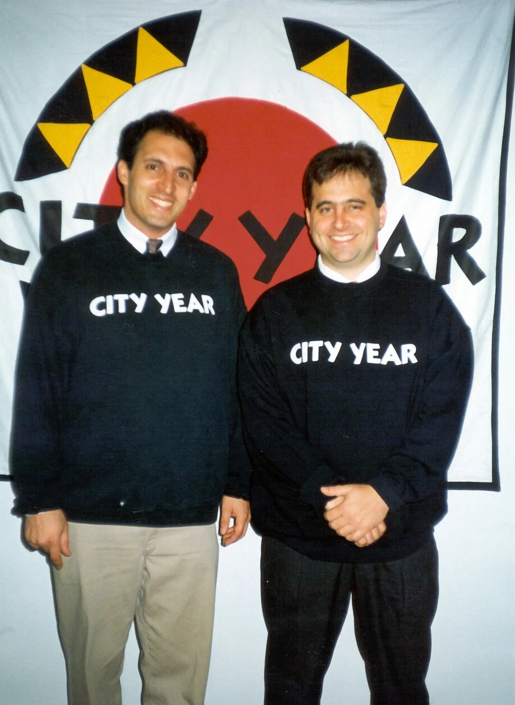 City Year co-founders Alan Khazei and Michael Brown in original City Year sweatshirts. (1988)