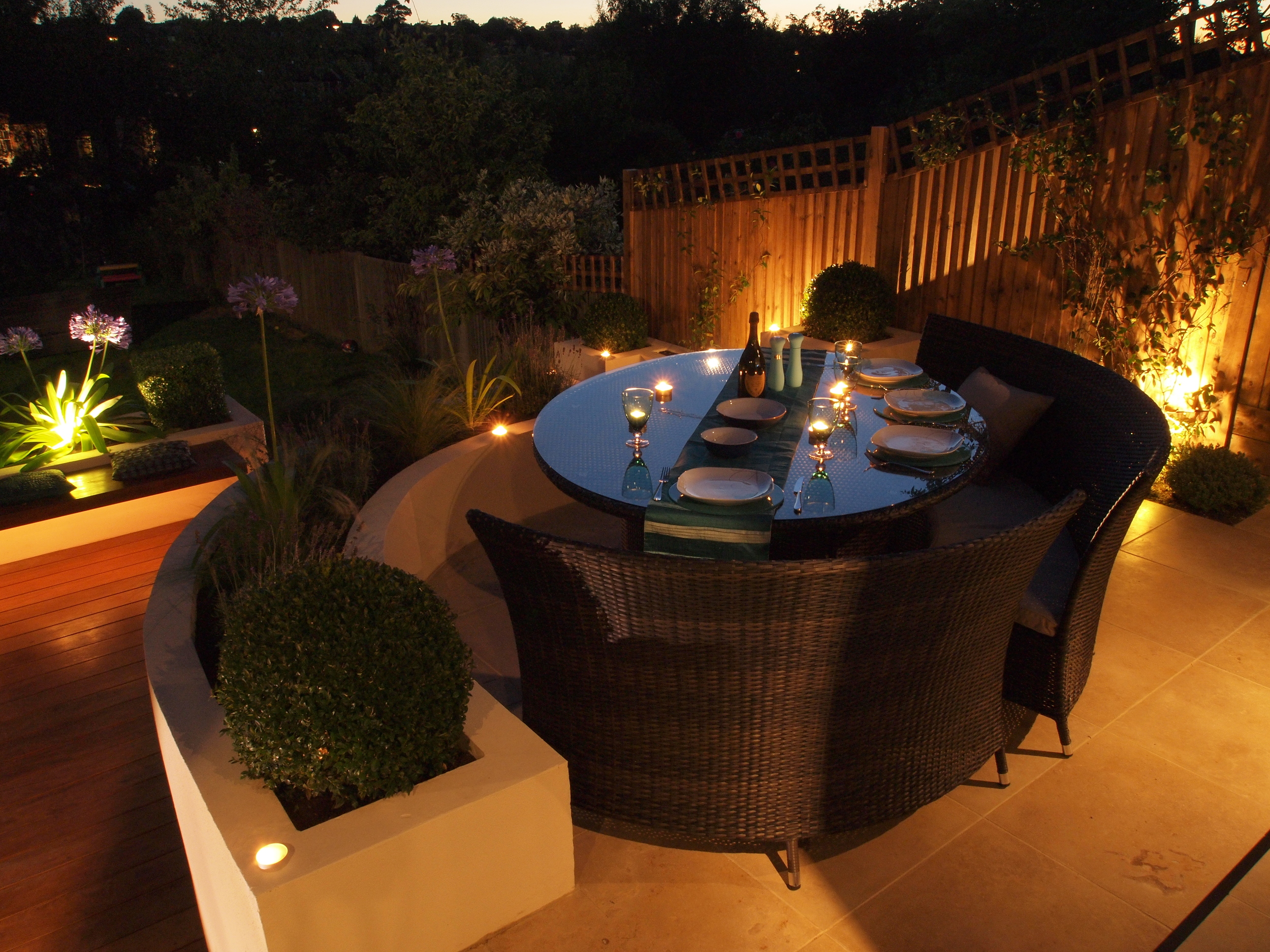 Stunning dining area in Muswell Hill garden makeover at night