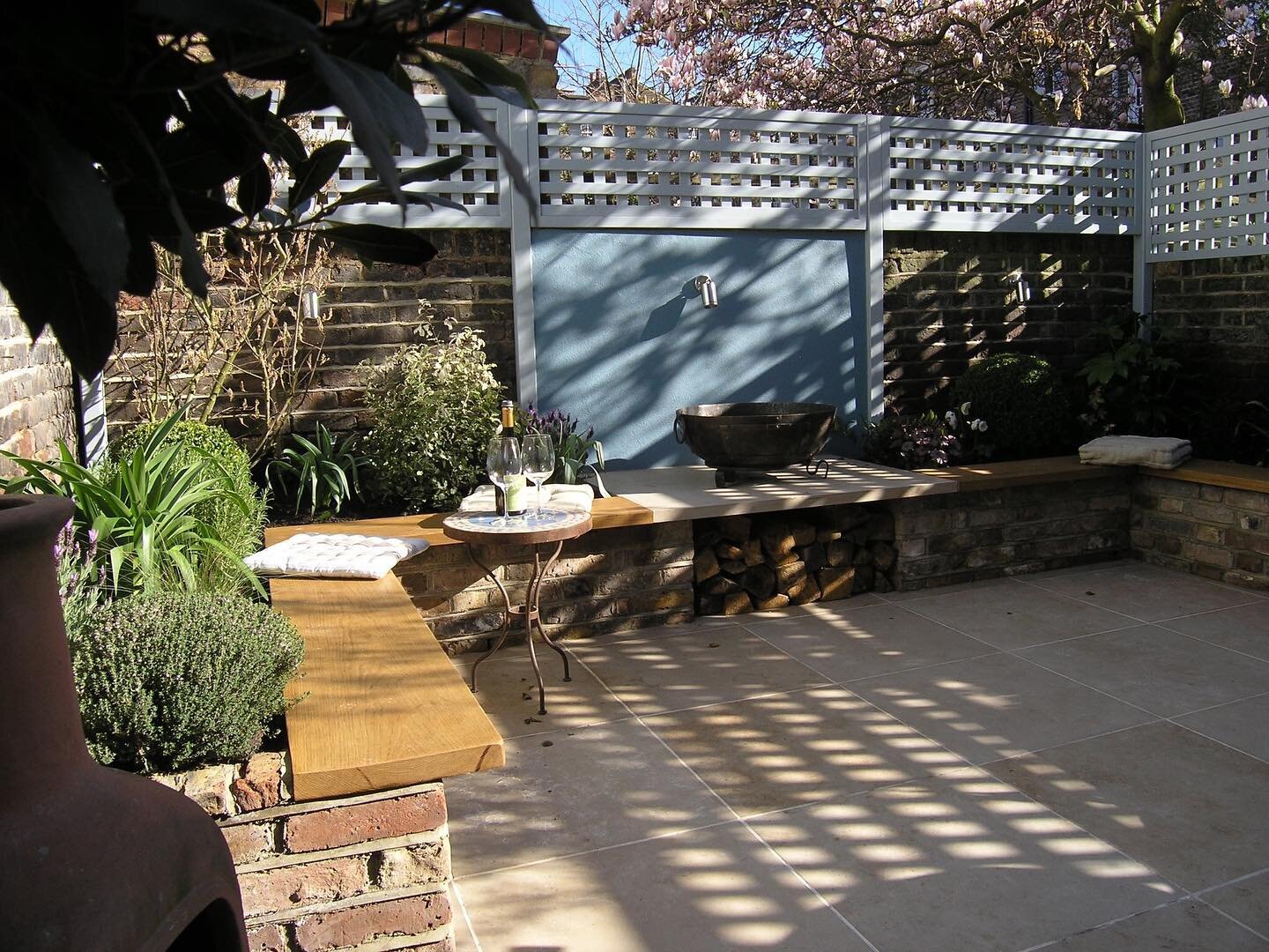 Enjoying the low September light in this Provence inspired, low maintenance courtyard garden in N1.