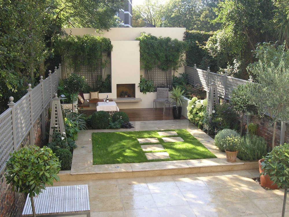  Stunning contemporary garden in N1 designed by Living Gardens with three distinct areas: the limestone patio, the lawn and the hardwood decking area. 
