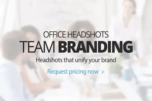 Text promoting office headshots for team branding with a blurred background of businesspeople in a meeting.