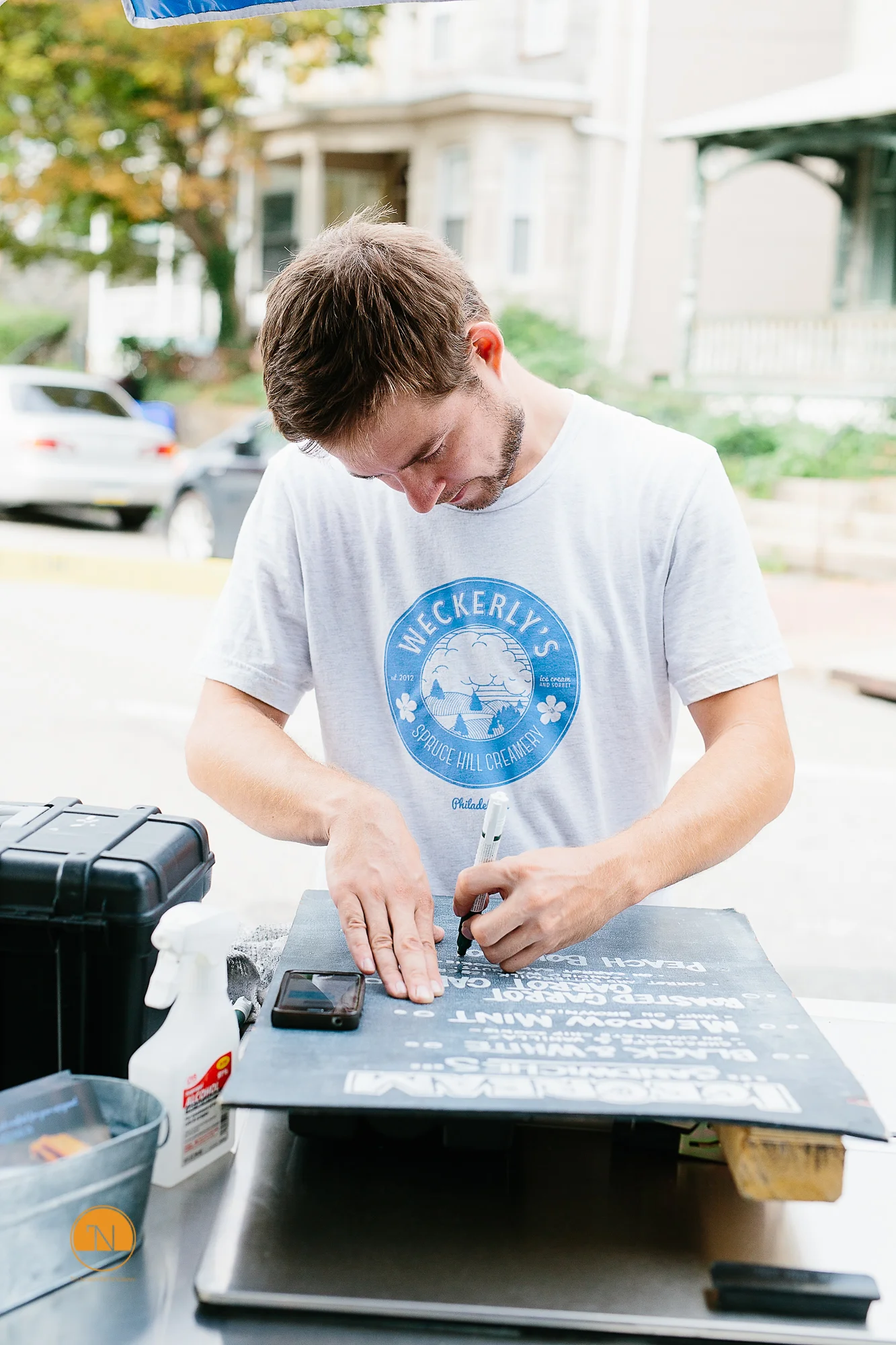 Tim Weckerle, writing what's going on the menu.