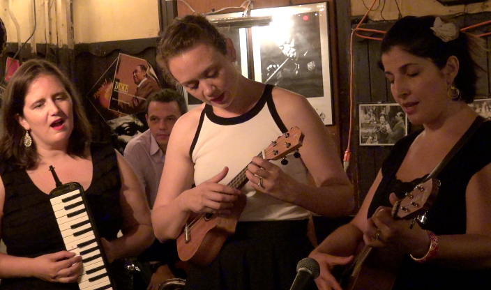 An unplugged version of Que Sera, Sera, with Amy on melodica and Hilary and Melissa on ukelele.