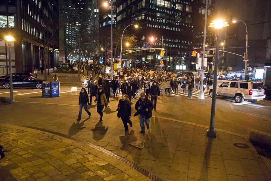 Protestors approaching the Staten Island ferry terminal. 