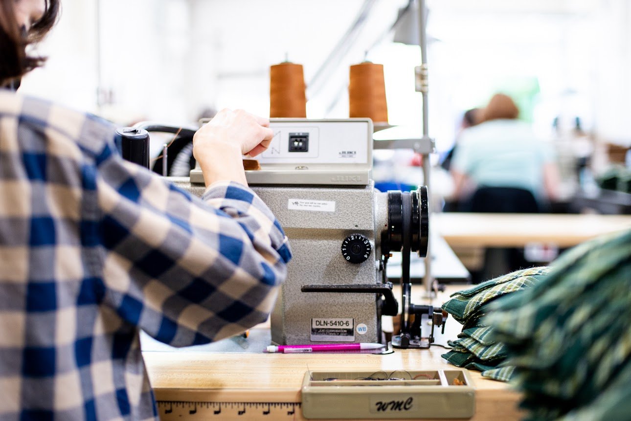 Spooltown-sewing-factory-portland-usa-made-orange-thread-plaid-shirt-juki-stitcher.jpg