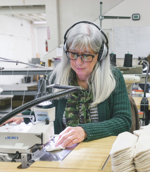Spooltown-sewing-factory-portland-usa-made-candace-glad-rags-production-serger.jpg