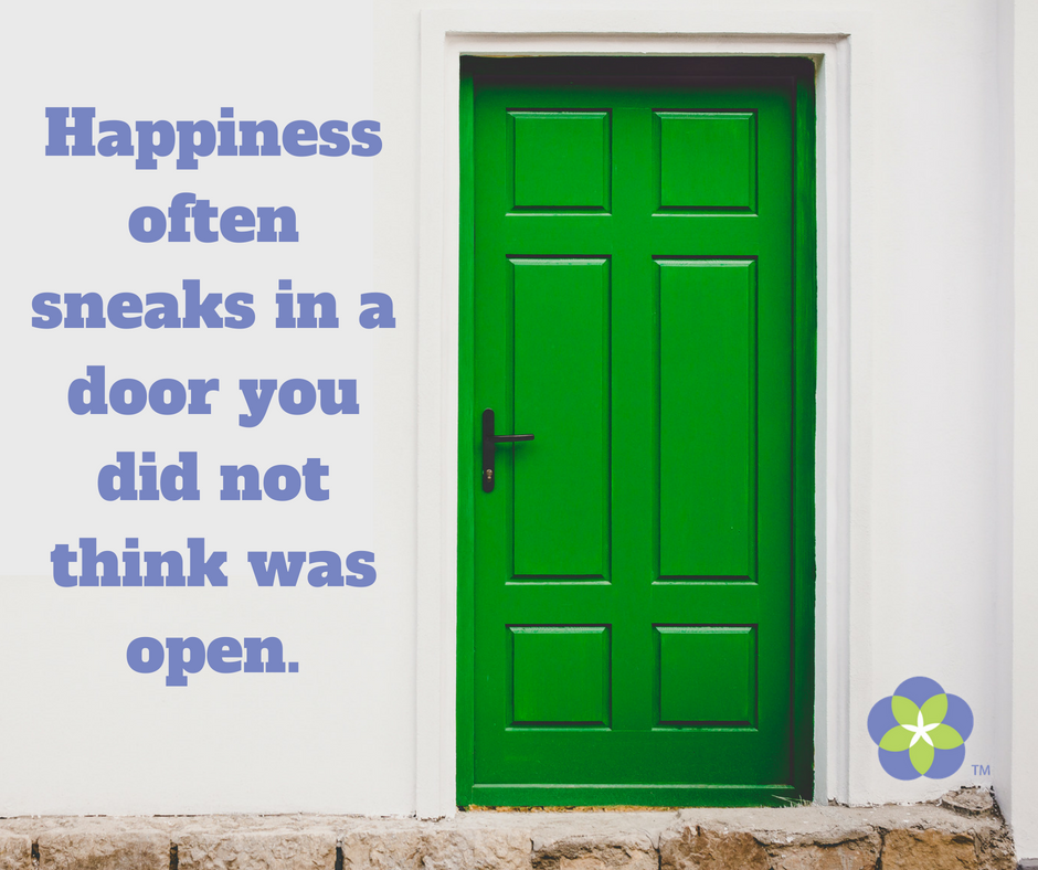 Happiness often sneaks in a door you did not think was open. (1).png