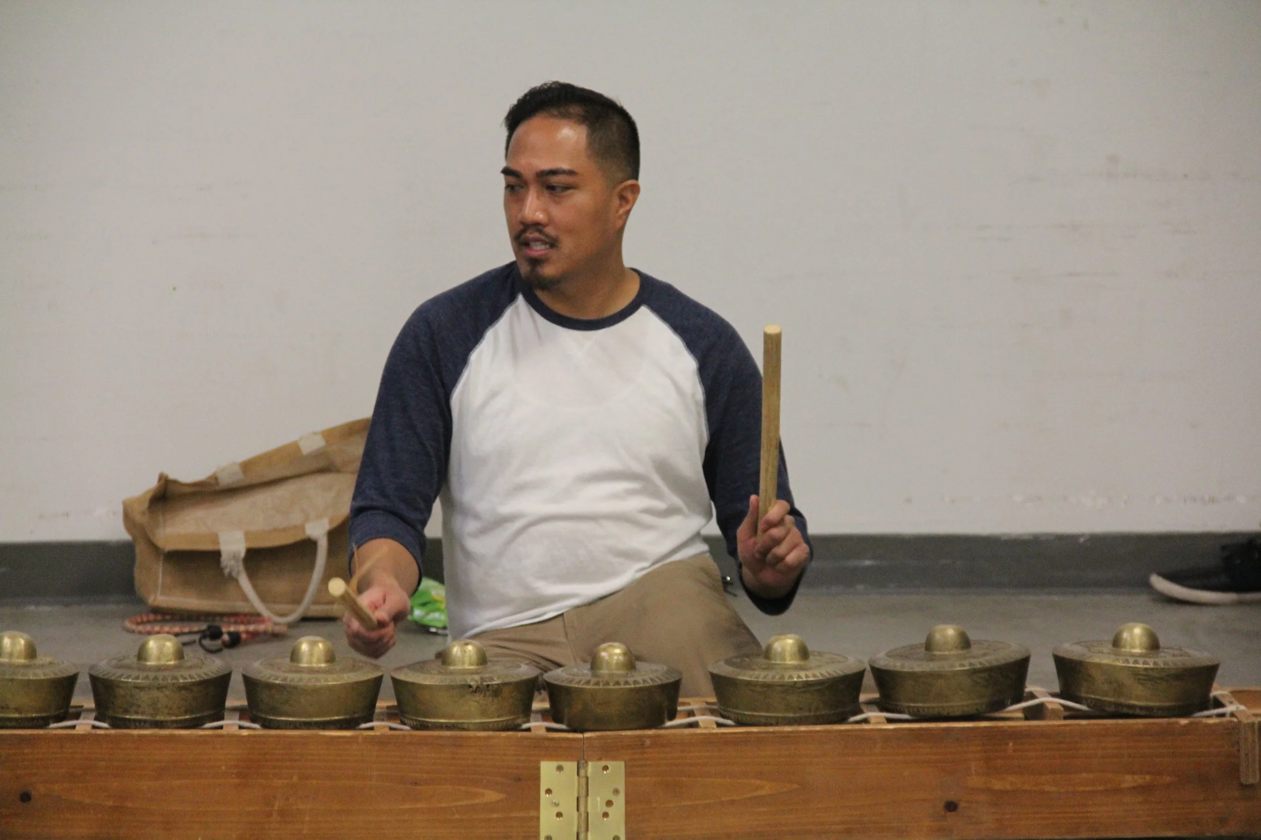 Bernard Ellorin demonstrates the kulintang before administering the second half of the workshop.