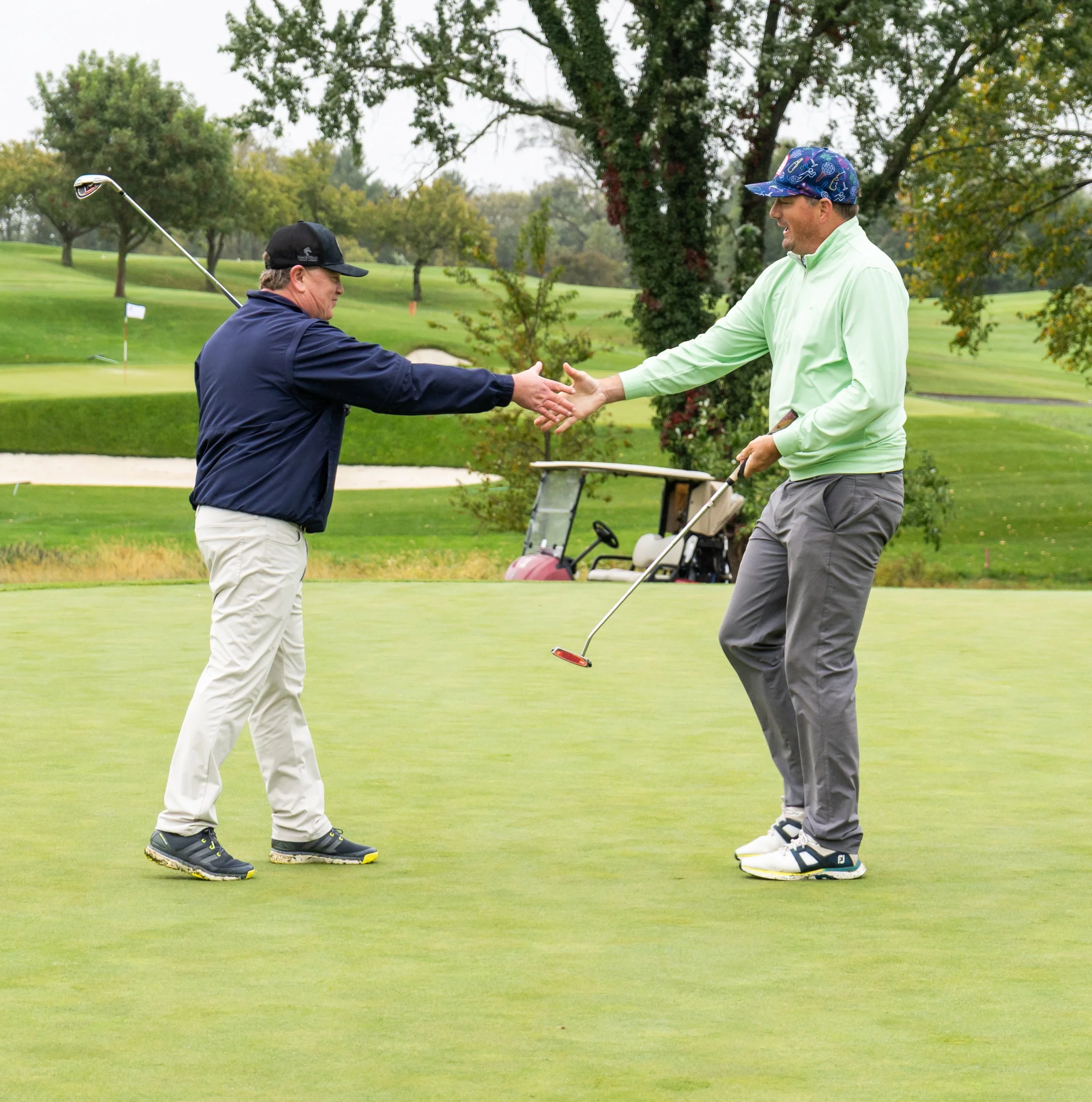 2025_CommunityCup-62_Adam handshake.jpg