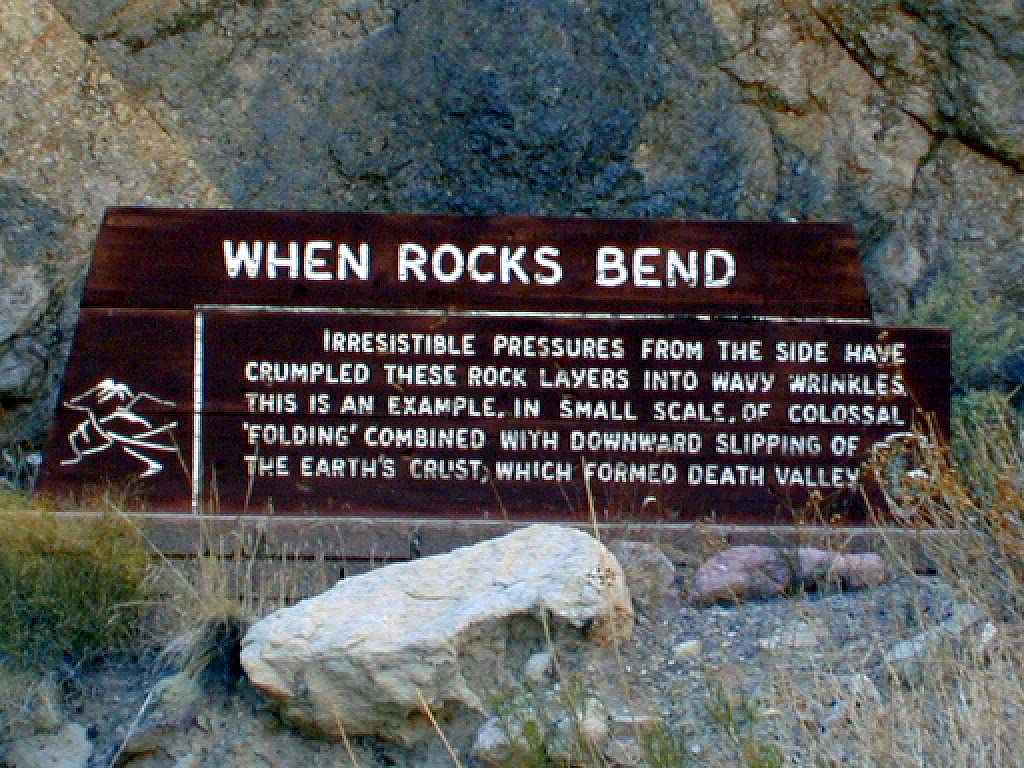 When Rocks Bend: Irresistible pressures from the side have crumpled these rock layers into wavy wrinkles. This is an example, in small scale, of colossal 'folding' combined with downward slipping of the Earth's crust, which formed Death Valley