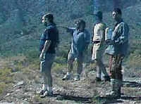 Chuck points out something in the valley