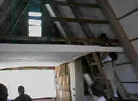 Chris climbs into the loft to check it out.