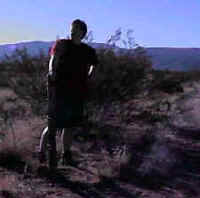 Mike holds the gate open for us to pass