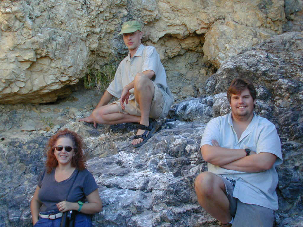 Maria, Kendal, and Mike pose on the rocks near Cow Camp