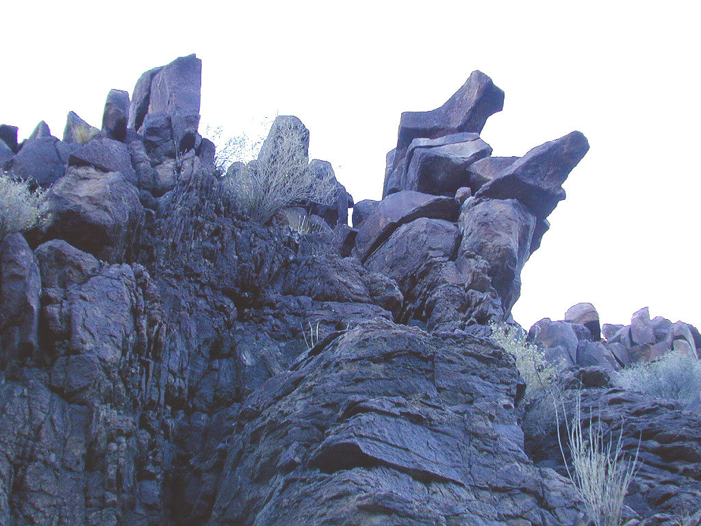 These formations are precariously balanced over our heads. They consist of large, sharp, and probably heavy rocks.