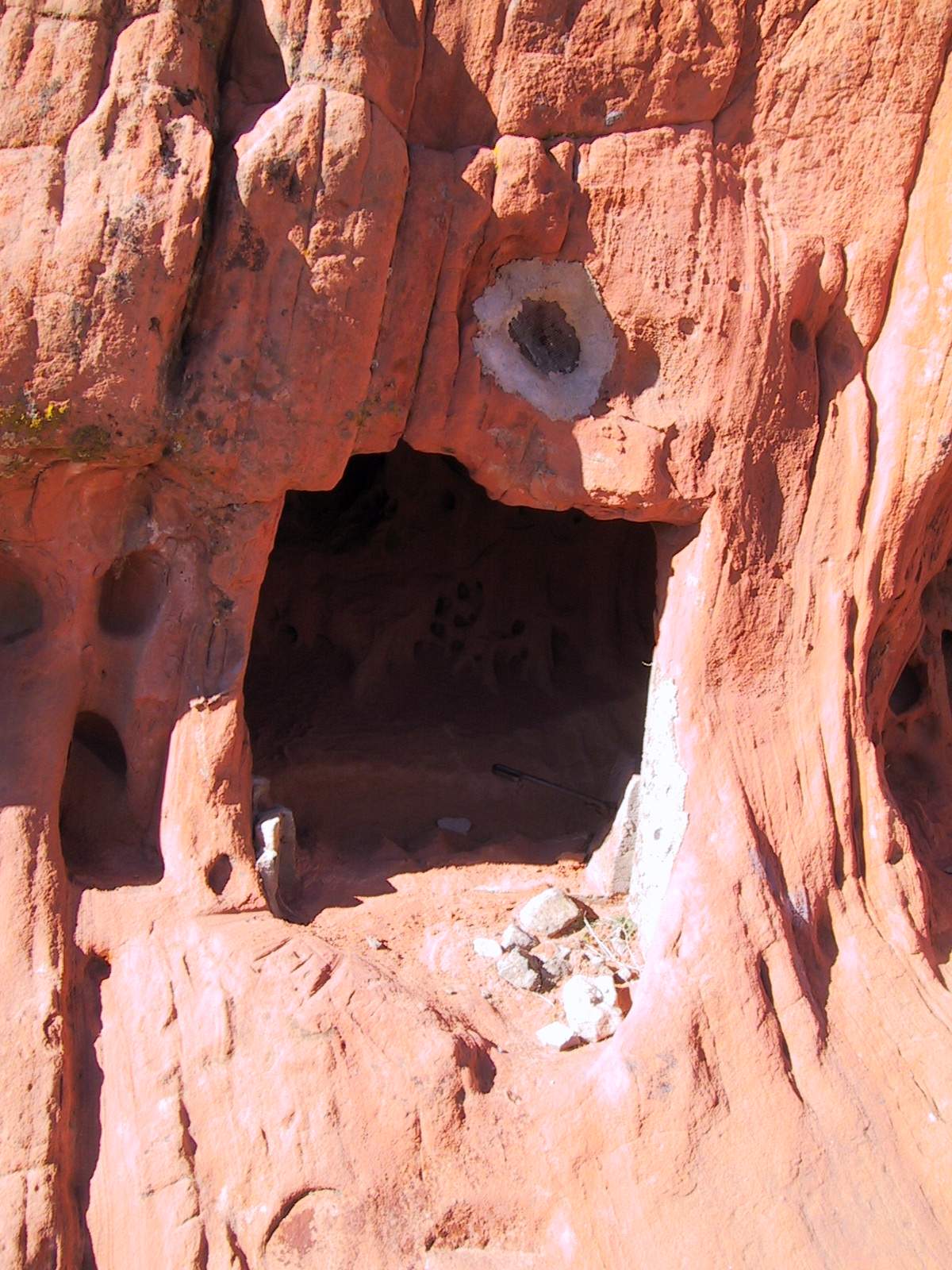 Another opening in the cliff. What was this for? The small hole above was fitted with a screen