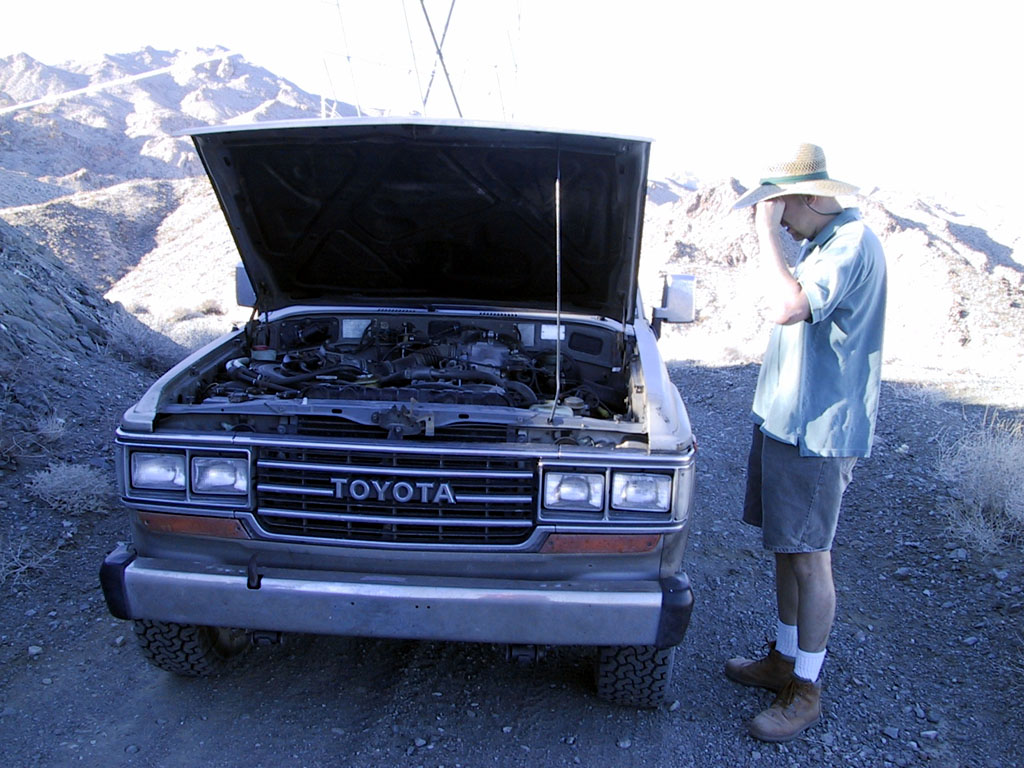 "Let me see... I know. It might be the brake fluid. I better check it."