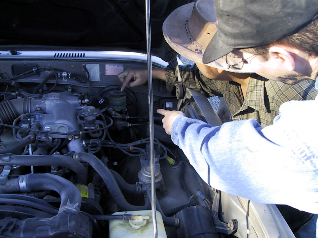 Hey, wait a minute Ted. The brake fluid is really over here, by the master brake cylinder.