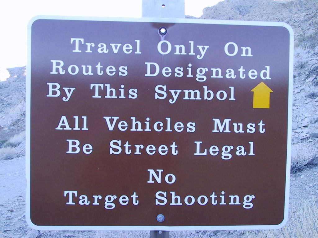 Travel only on routes designated by this symbol. All vehicles must be street legal. No target shooting.