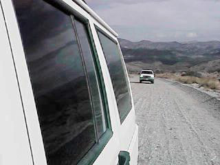 The trailing vehicles are driving sanely. Notice that no wall of flash-flood water is following us -- thank goodness.