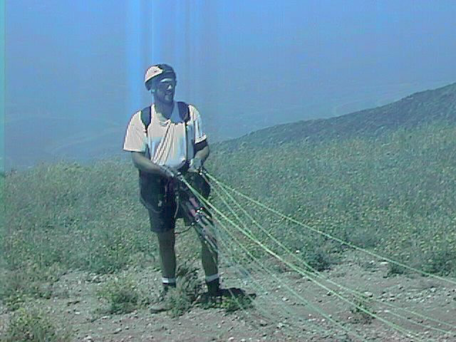 Kucan sets up and waits for the wind